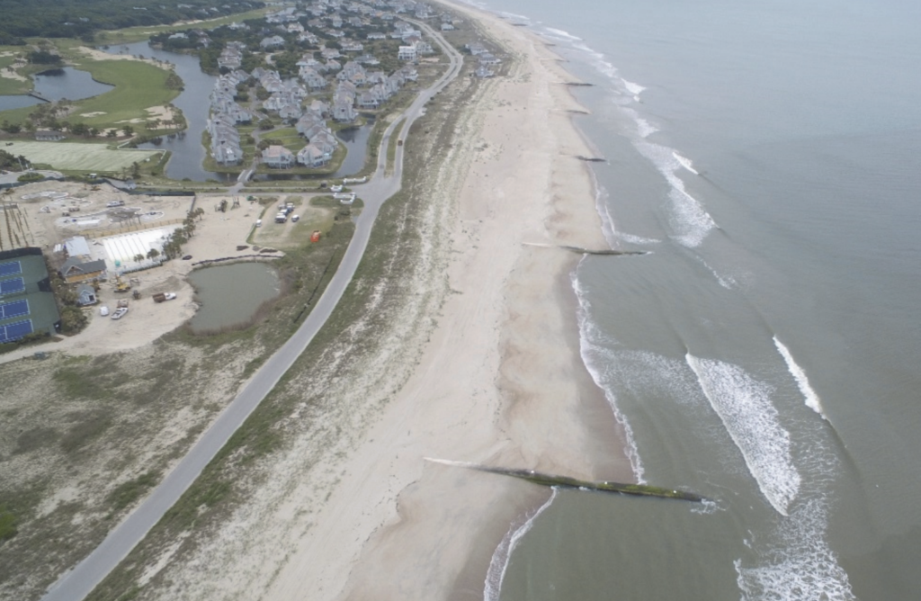 Photograph of a series of groins along a beach