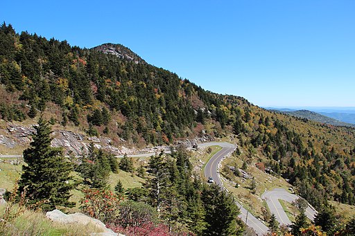 Image of Grandfather Mountain, dotted with roads turning sharply.